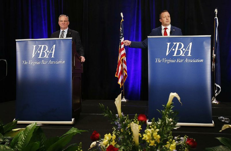 U.S. Sen. Tim Kaine (left) and Republican challenger Corey Stewart face off Saturday at the Virginia Bar Association-sponsored debate in Hot Springs, Va.  