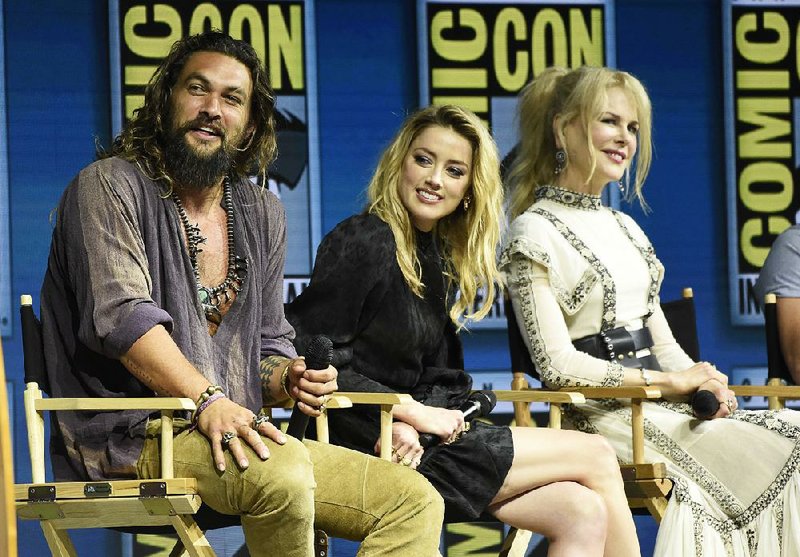Jason Momoa, from left, Amber Heard and Nicole Kidman attend the Warner Bros. Theatrical panel for "Aquaman" on day three of Comic-Con International on Saturday, July 21, 2018, in San Diego. 