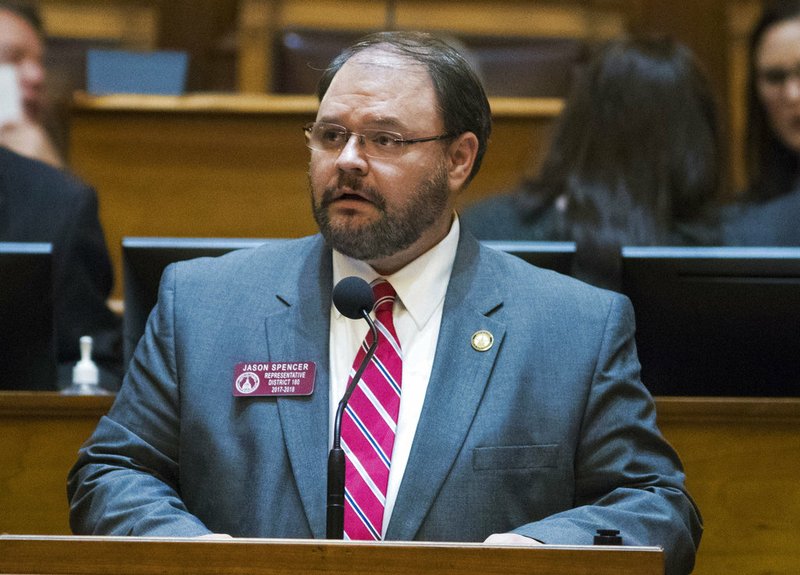 In this Feb. 28, 2018 photo, Rep. Jason Spencer, of Woodbine, speaks at the Georgia State Capitol in Atlanta. Spencer is seen using racial slurs and dropping his pants in an episode of Sacha Baron Cohen's Showtime series "Who Is America?". In the Sunday, July 22, broadcast, Spencer repeatedly uses a racial slur for African Americans and later exposes his bottom after being told it helps scare away Muslim terrorists. (Alyssa Pointer/Atlanta Journal-Constitution via AP)