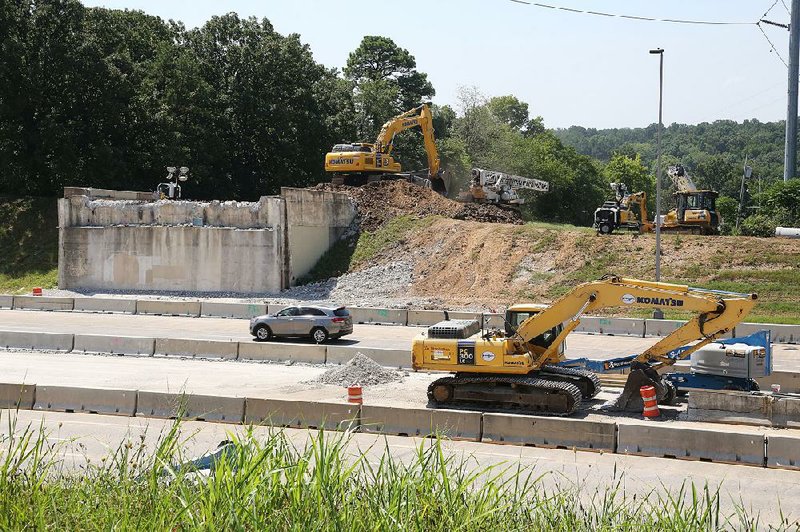 FILE PHOTO: Construction crews work on the Interstate 630 expansion in July near where the Hughes Street overpass was removed. 