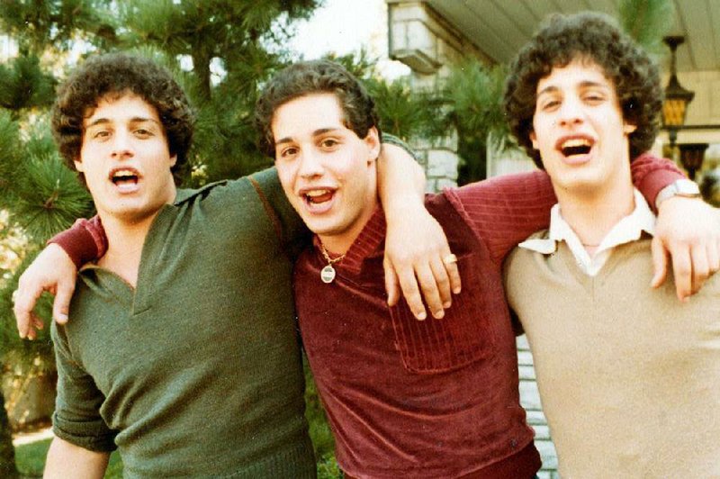 From left, separated-at-birth triplets Eddy Galland, David Kellman and Bobby Shafran are shown soon after they were reunited in 1980. The men are the subject of Tim Wardle’s fascinating and chilling documentary Three Identical Strangers.