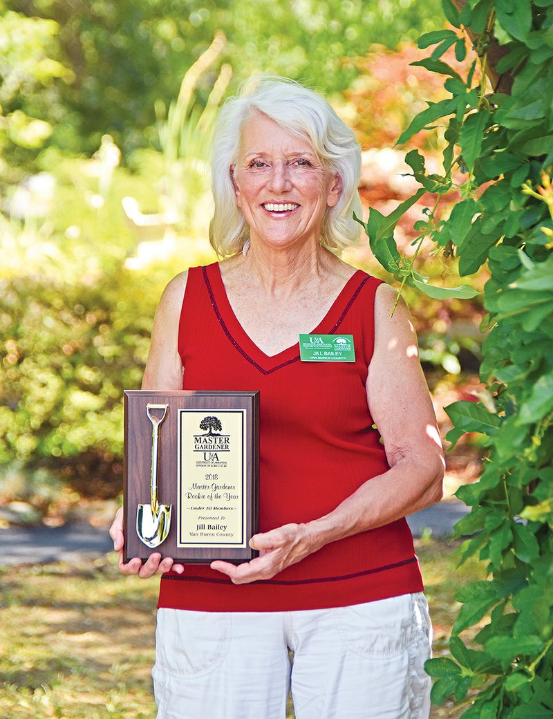 Jill Bailey visits one of the many gardens the Van Buren County Master Gardeners maintain in Ed Leamon Park in Fairfield Bay. Bailey was recently named State Master Gardener Rookie of the Year for programs with 50 members or less.