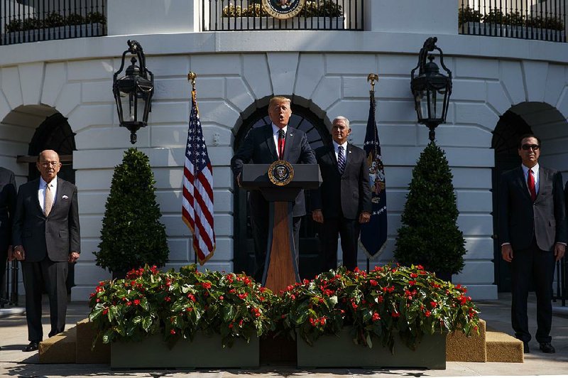 President Donald Trump, with Vice President Mike Pence at his side Friday at the White House, predicted that growth for all of 2018 would be the best in 13 years, a view most economists don’t share. 