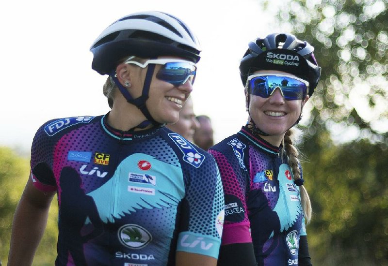 Tetiana Kalachova (left) and Christine Michelet are members of the female team of amateur cyclists completing the Tour de France route to raise awareness for women’s cycling and promote the return of the women’s Tour. 