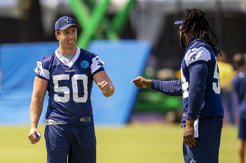 Dallas Cowboys linebacker Sean Lee (left) responded Friday night to a tweet by former teammate Dez Bryant saying he had something to do with Bryant’s release from the team. “To say that I can get anybody off the team and have any input on a roster is absurd,” Lee said.  