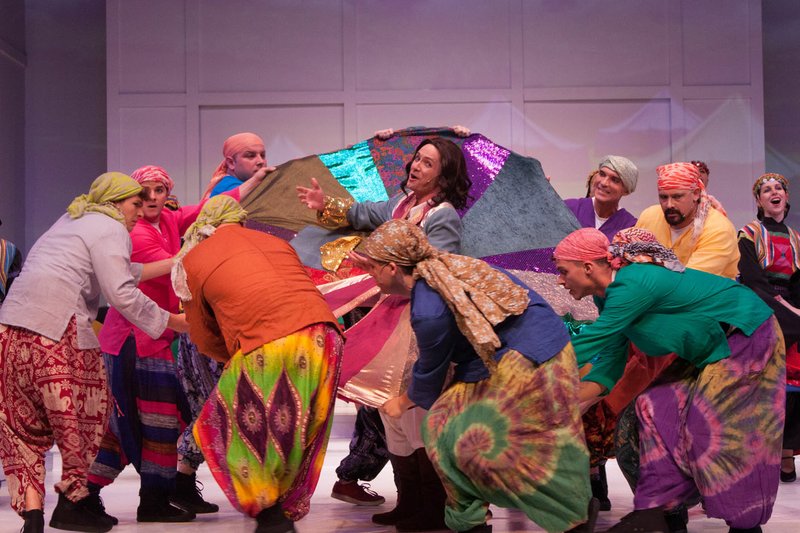 Photo courtesy Lori Collier Joseph (Joshua Jones, center) celebrates his coat of many colors surrounded by his brothers in the Arkansas Public Theatre production of "Joseph and the Amazing Technicolor Dreamcoat," on stage today.