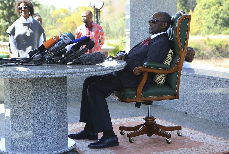 Former Zimbabwean President Robert Mugabe holds a press briefing at his residence in Harare on Sunday, on the eve of the country’s elections.