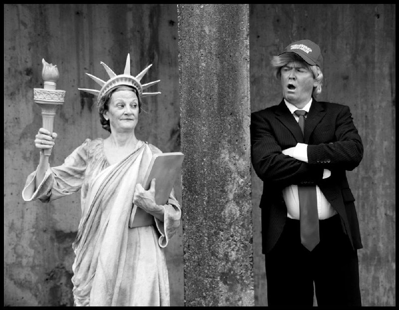 Kathryn Pryor is the Statue of Liberty and Craig Wilson is Donald Trump in the latest edition of the biennial satirical musical production Gridiron, which opens Tuesday at The Rep. Photo by Leanne Kamps.