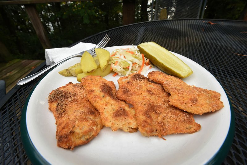 Baked fish is a delicious and healthy way to enjoy the catch of the day. Baked Parmesan fish, shown here using crappie filets, is one of many tasty recipes.