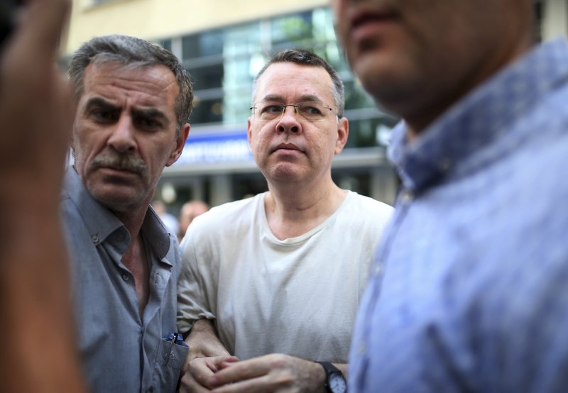 In this July 25, 2018 photo, Andrew Craig Brunson, an evangelical pastor from Black Mountain, North Carolina, arrives at his house in Izmir, Turkey.  (AP Photo/Emre Tazegul)