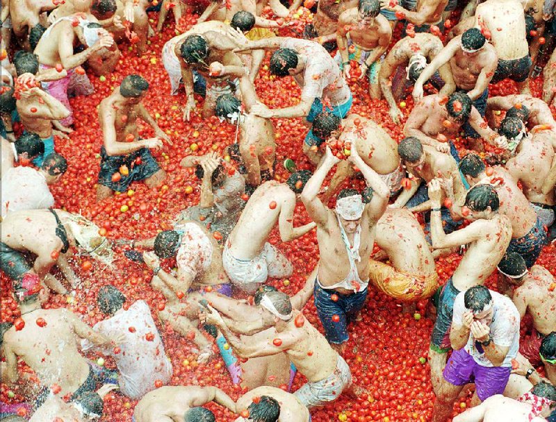 The annual “tomatina” tomato fight in Bunol, Spain, could be considered a hubbub or mock melee, but not a brouhaha or kerfuffle. Fayetteville-born Otus the Head Cat’s award-winning column of humorous fabrication appears every Saturday.