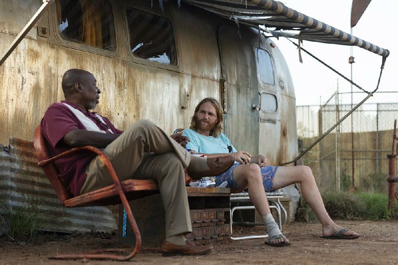 AMC’s new Lodge 49 stars Little Rock native Brent Jennings (left) as Ernie Fontaine and Wyatt Russell as Sean “Dud” Dudley. 