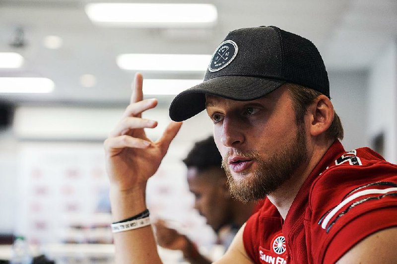 Arkansas State senior quarterback Justice Hansen talks to reporters during media day Thursday at the ASU football complex in Jonesboro. The Sun Belt Offensive Player of the Year is back to lead the offense after a 2017 season in which he threw for 3,967 yards and 37 touchdowns and completed 62.6 percent of his passes.