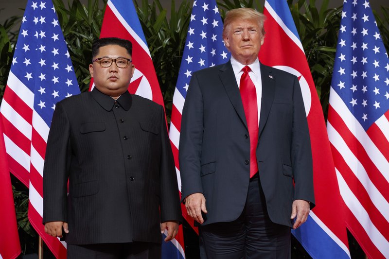FILE - In this June. 12, 2018, file photo, U.S. President Donald Trump meets with North Korean leader Kim Jong Un on Sentosa Island, in Singapore. The White House says President Donald Trump received a new letter from North Korean leader Kim Jong Un Wednesday following up on their Singapore summit. (AP Photo/Evan Vucci, File)