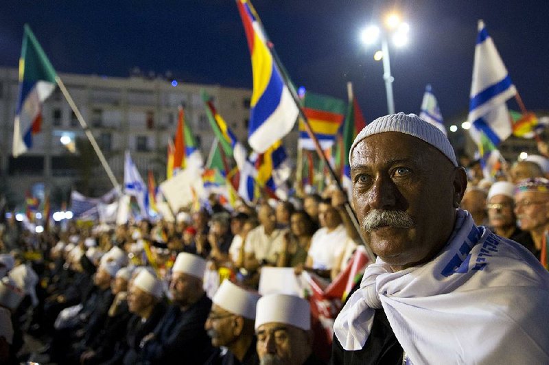 Thousands of people, many from the Druze community, pack the square Saturday in Tel Aviv pro- testing Israel’s Jewish nation bill.