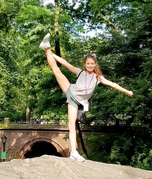 Photo submitted Samantha Handcock Blair practiced a heel stretch in Central Park during her trip to New York, N.Y. for the All Star Dancers National Convention in New York City. Samantha's mom, Angela Blair, said she practices 24/7.