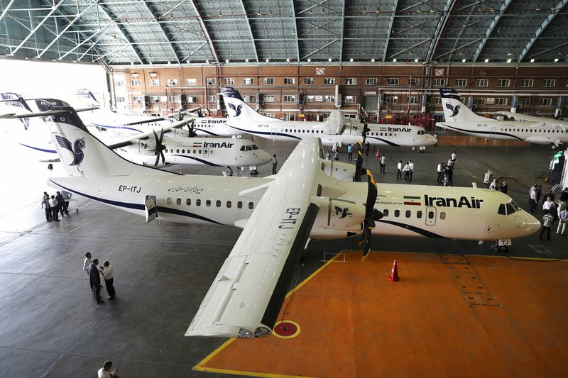 In this photo provided by Tasnim News Agency, Iran Air's new commercial aircrafts are parked at Mehrabad airport in Tehran, Iran, Sunday, Aug. 5, 2018. Iran has acquired five new ATR72-600 airplanes from ATR, jointly owned by European consortium Airbus and Italy's Leonardo, a day before the U.S. begins restoring sanctions suspended under the 2015 nuclear deal.