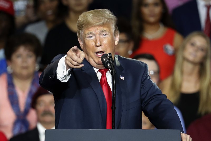 President Donald Trump speaks during a rally, Saturday, Aug. 4, 2018, in Lewis Center, Ohio. (AP Photo/John Minchillo)