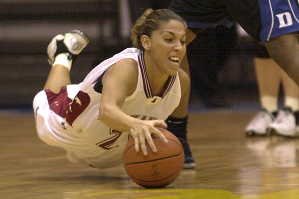 Arkansas' India Lewis falls to the court trying to catch a loose ball during the championship game against Duke at the Paradise Jam Basketball Tournament in St. Thomas, Virgin Islands, Saturday, Nov. 30, 2002. Duke beat Arkansas 74-72 in overtime. (AP Photo/Andres Leighton)

