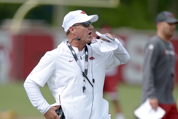 Arkansas coach Chad Morris watches Tuesday, Aug. 7, 2018, during practice at the university practice fields in Fayetteville. Visit nwadg.com/photos to see more photographs from the practice.