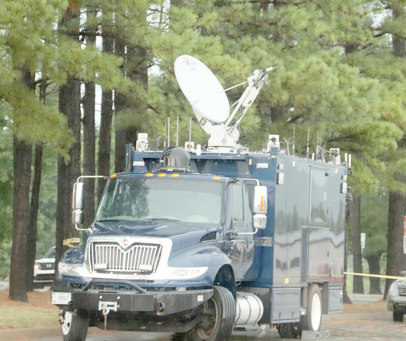 LYNN KUTTER ENTERPRISE-LEADER The 61st Civil Support Team out of Camp Robinson in Little Rock brought seven of its vehicles for a training exercise at Farmington Middle School. This truck with a satellite is part of a universal communication system that allows the team to link up with communications anywhere they go.