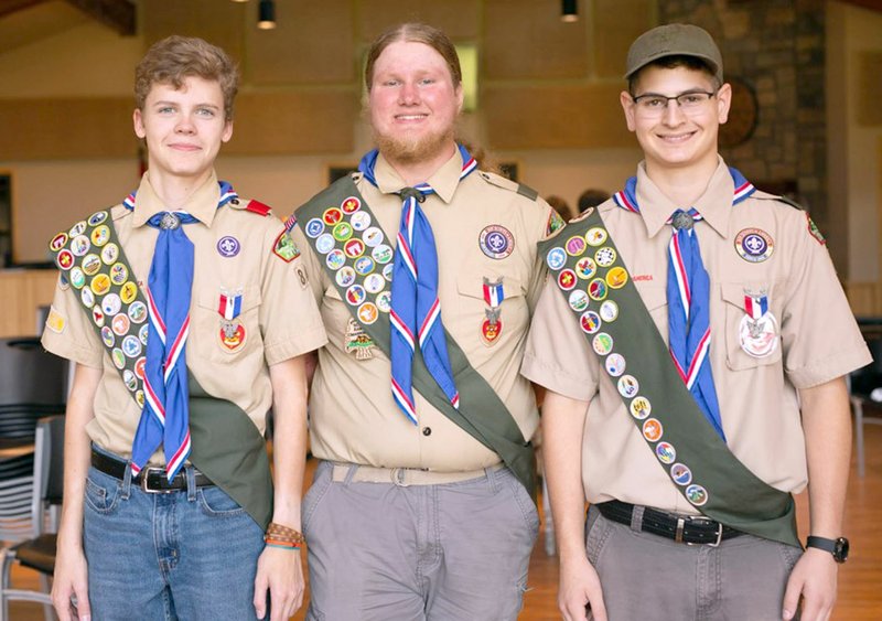 Hunter McFerrin/Herald-Leader The newest Eagle Scouts from Troop 84 in Siloam Springs held their Eagle Ceremony on Aug. 4 at New Life Ranch, in which three scouts were selected. Pictured, from left, are Nate Youmans, 16, Stephen Norwood, 18, Joseph Hahn, 18.