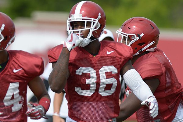 Arkansas linebacker D'Vone McClure (36) participates in a drill Tuesday, Aug. 7, 2018, during practice at the university practice fields in Fayetteville.
