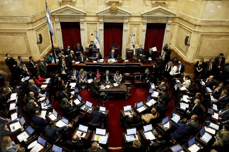 Argentina’s senators take their places Wednesday in Buenos Aires ahead of a debate on legislation that would decriminalize abortion in the country. The bill would allow girls as young as 13 to terminate pregnancies for any reason within the first 14 weeks of term. The measure passed in the Argentine house in June. 
