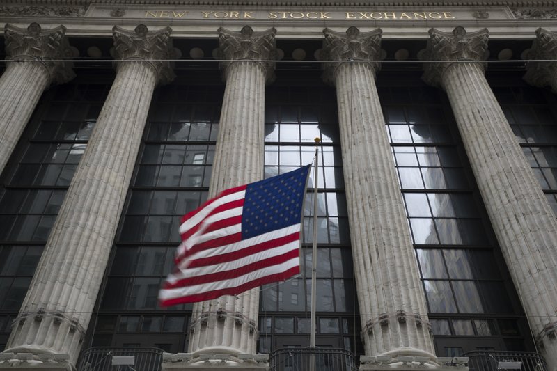 In this April 24, 2018, file photo, an American flag flies outside the New York Stock Exchange. (AP Photo/Mary Altaffer, File)