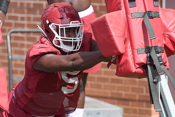 Arkansas defensive lineman Dorian Gerald goes through practice Monday, Aug. 6, 2018, in Fayetteville.