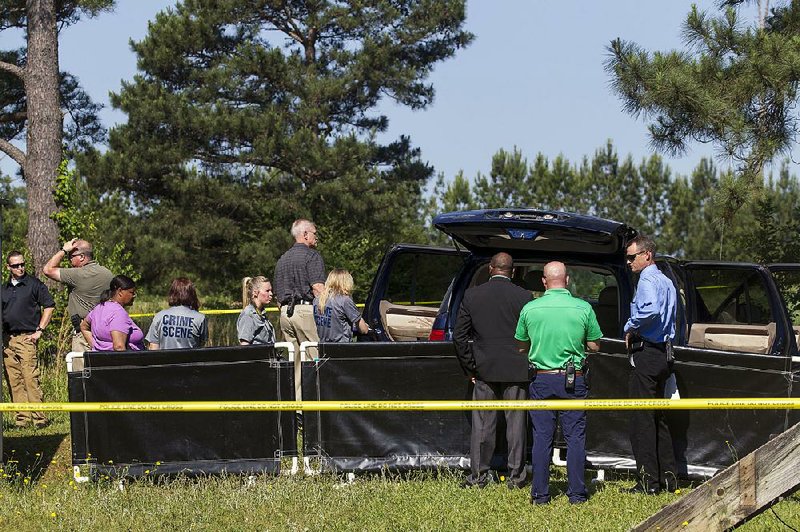 Little Rock police found the bodies of a 32-year-old woman and her 15-year-old daughter in this SUV parked near an empty mobile home on Chicot Road in mid-May 2017. Investigators later learned that the man who shot them killed himself.