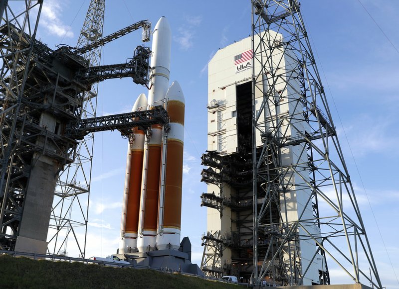 A Delta IV rocket stands ready for launch at complex 37 at the Kennedy Space Center, Friday, Aug. 10, 2018, in Cape Canaveral, Fla. The Parker Solar Probe, scheduled for lift off early Saturday morning, is protected by a first-of-its-kind heat shield and other innovative technologies that will provide unprecedented information about our Sun.