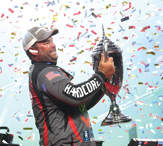 Clent Davis celebrates after winning the Forrest Wood Cup at Bank of the OZK Arena Sunday August 12, 2018. (The Sentinel-Record/Richard Rasmussen)