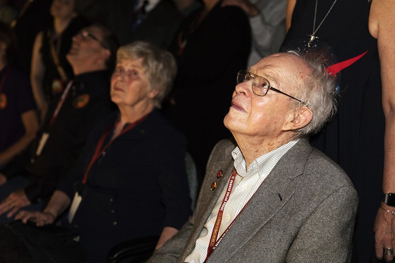 Eugene Parker (front right), a pioneer in heliophysics, watches the launch of the Delta IV rocket, carrying the Parker Solar Probe, at the Kennedy Space Center on Sunday, in Cape Canaveral, Fla.