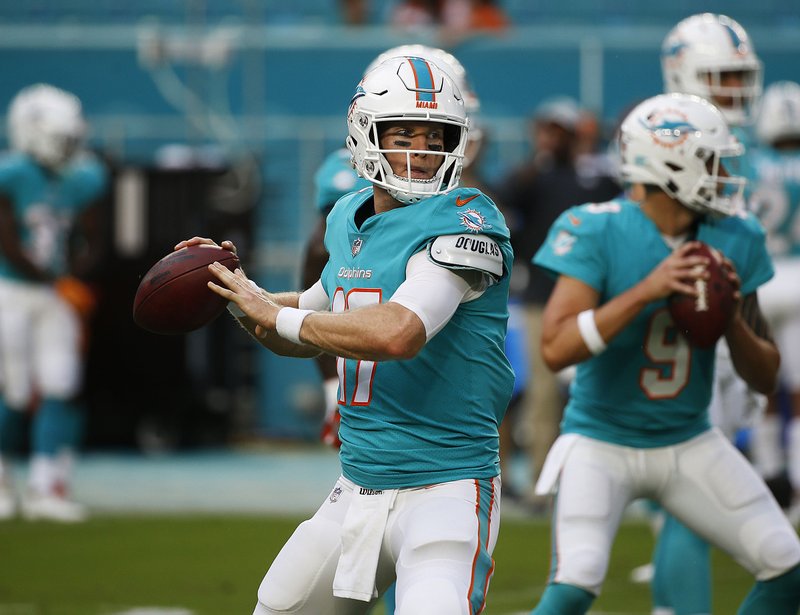 Miami Dolphins quarterback Ryan Tannehill was not pleased with running back Kalen Ballage on Sunday after Ballage missed a blocking assignment. 