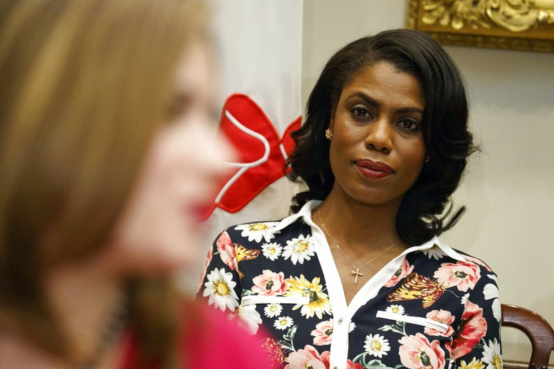 FILE - In this Feb. 14, 2017, file photo, Omarosa Manigault-Newman, then an aide to President Donald Trump, watches during a meeting with parents and teachers in the Roosevelt Room of the White House in Washington. The White House is slamming a new book by ex-staffer Omarosa Manigault-Newman, calling her “a disgruntled former White House employee.” (AP Photo/Evan Vucci, File)

