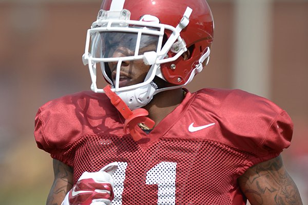 Arkansas defensive back Ryan Pulley participates in a drill Tuesday, Aug. 7, 2018, during practice at the university practice fields in Fayetteville.