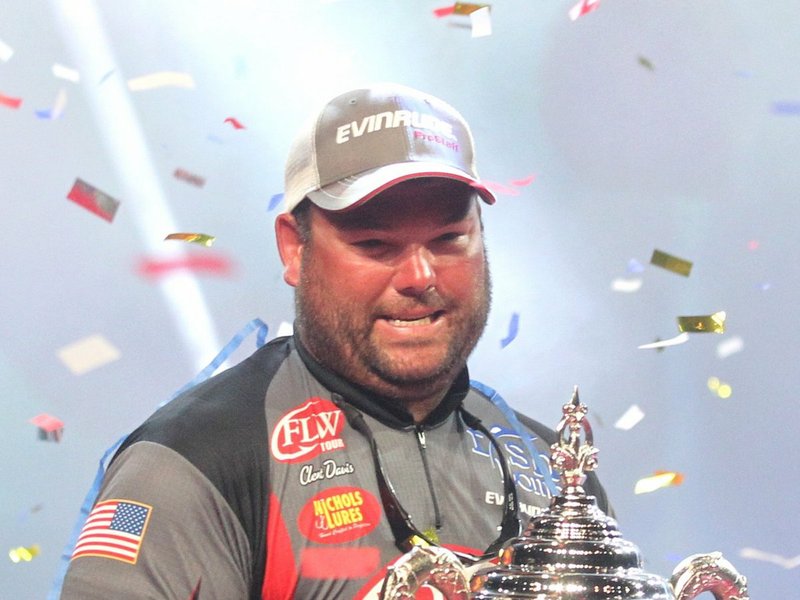 The Sentinel-Record/Richard Rasmussen CUP CHAMP: Clent Davis celebrates Sunday at Bank OZK Arena after winning the Fishing League Worldwide's Forrest Wood Cup and a $300,000 prize.