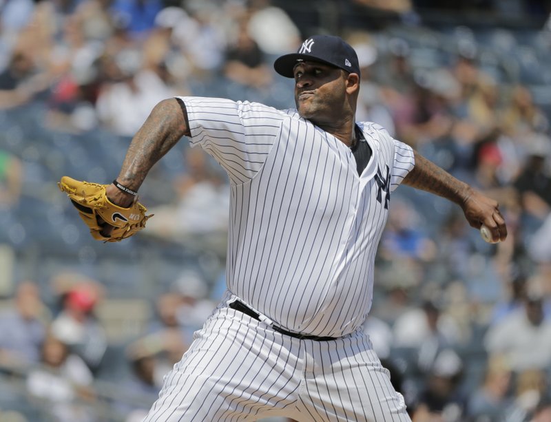 New York Yankees starting pitcher CC Sabathia throws during the first inning of a baseball game against the Texas Rangers at Yankee Stadium Sunday, Aug. 12, 2018, in New York. (AP Photo/Seth Wenig)