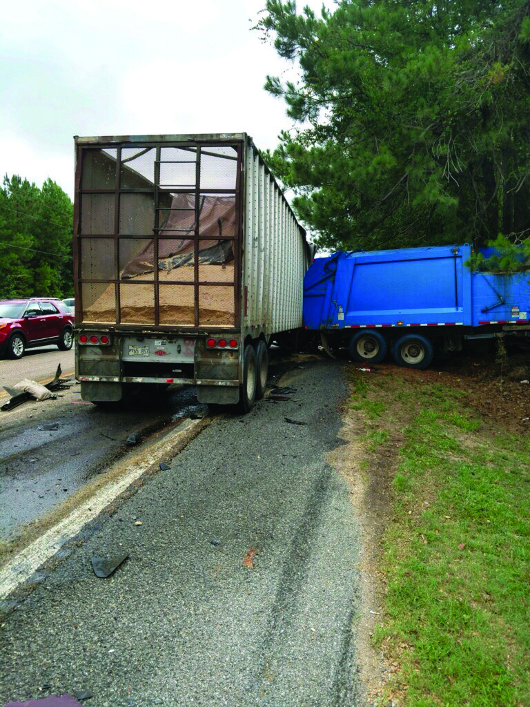 Crash: A commercial chip truck struck the back end of a Union County garbage truck in a collision on Highway 82 yesterday.