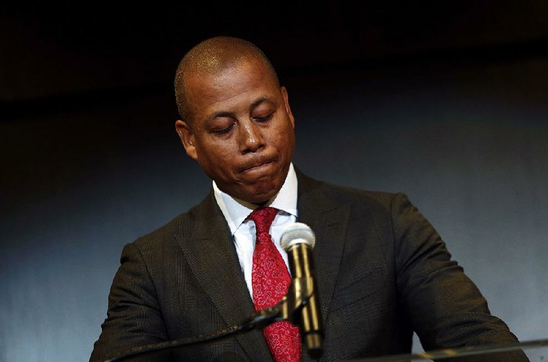 Maryland Athletic Director Damon Evans pauses as he speaks Tuesday at a news conference at the school in College Park, Md., to address the football program and the death of offensive lineman Jordan McNair, who collapsed on a practice field and subsequently died. Evans said “mistakes were made” in the treatment of McNair after he fell ill during a conditioning drill. 
