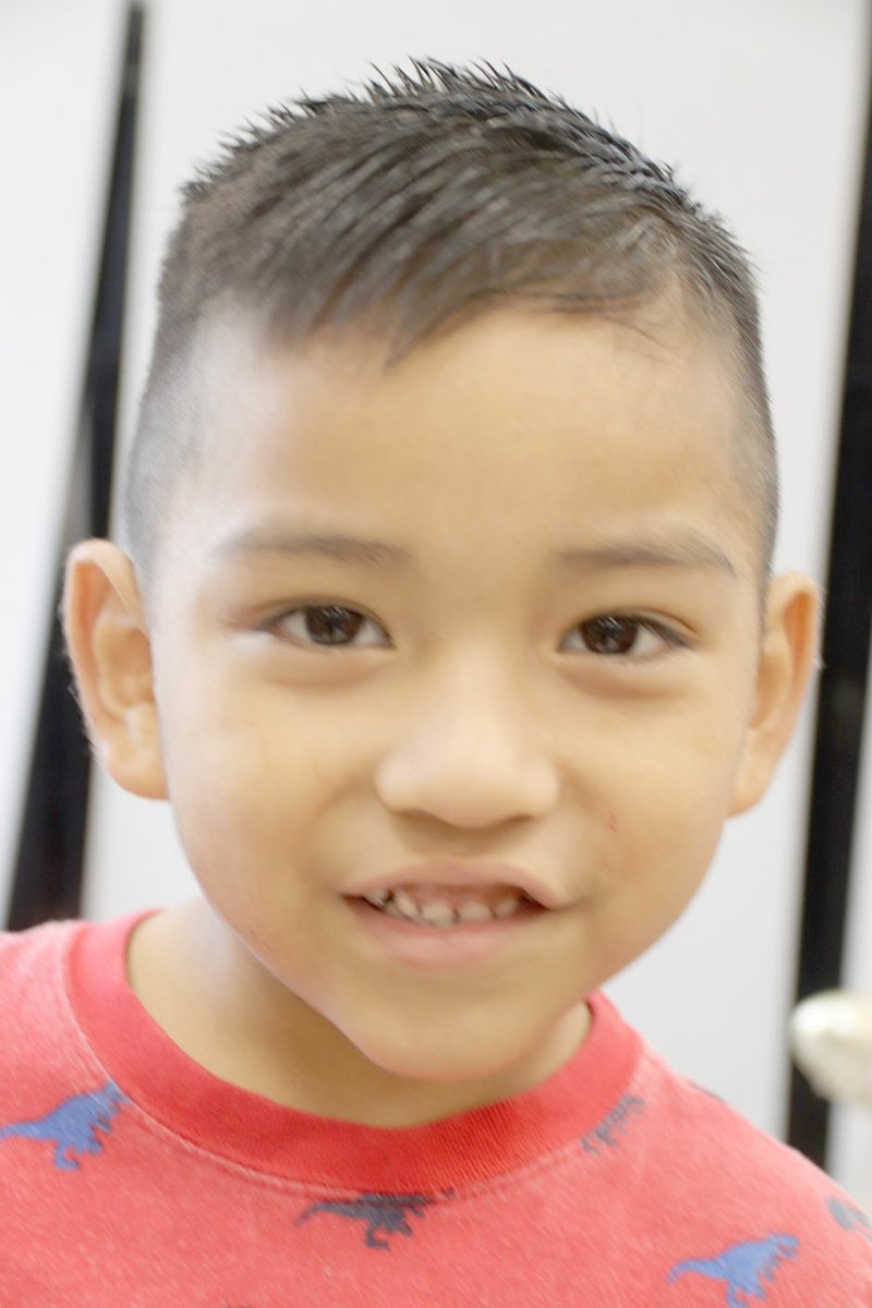 Jayden Colmenero, 4, of Lincoln, shows off his new haircut. Jayden will be in Lincoln's preschool program this year.