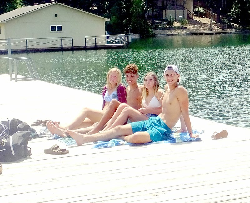 Lynn Atkins/The Weekly Vista Swimmers who use the docks on Bella Vista Lakes are not counted among the recreation users since they don't pay a fee. Swimmers at the new Avalon Beach are counted among the outdoor pool users.