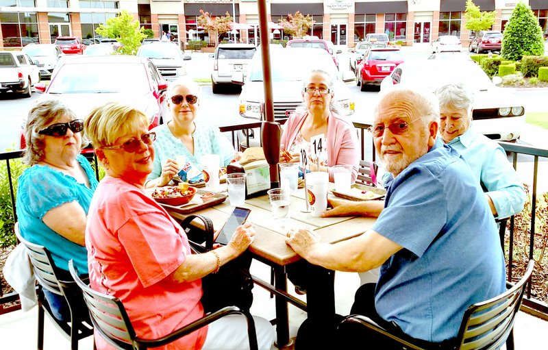 Photo submitted Bella Vista Community Church's prayer team enjoys fellowship over lunch with Pastor Cody last Wednesday. The prayer team invites all to join it for prayer and worship at 10:30 a.m. each Wednesday in the BVCC chapel.