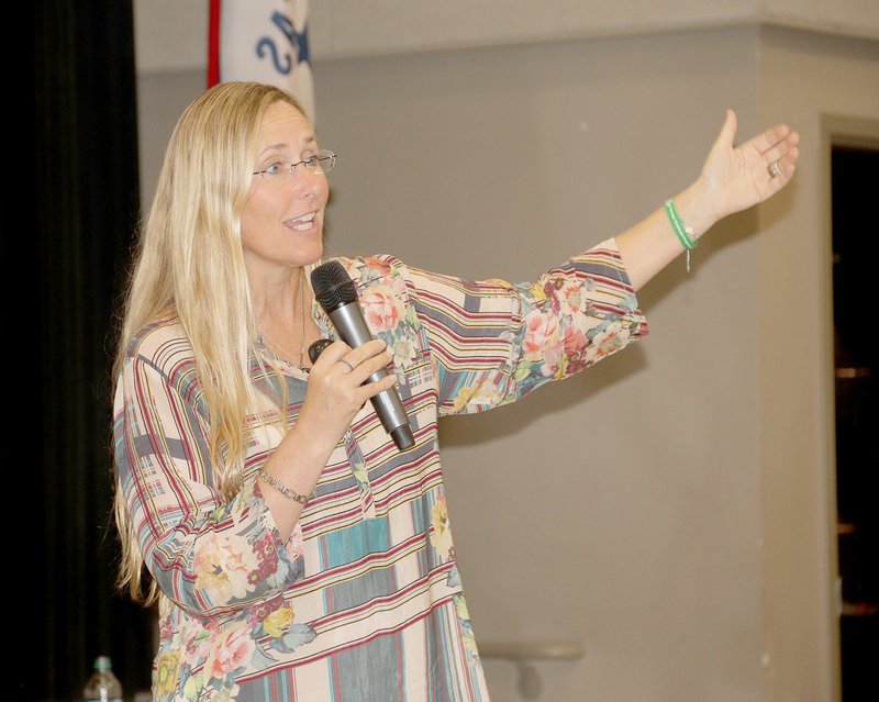 LYNN KUTTER ENTERPRISE-LEADER Scarlett Lewis, whose 6-year-old son, Jesse, was killed in the Sandy Hook Elementary School shooting in 2012, addresses Prairie Grove teachers Thursday about a social and emotional learning program called Choose Love Enrichment Program.