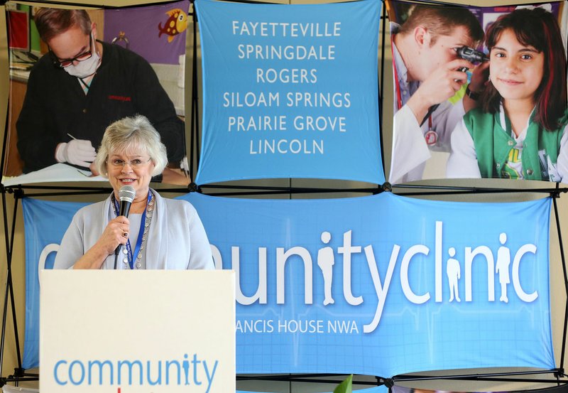 NWA Democrat-Gazette/DAVID GOTTSCHALK Kathy Grisham, executive director of the Community Clinic, speaks Tuesday during a public celebration in recognition of National Community Health Center Week at the Jones Center for Nonprofits in Springdale. The celebration included a presentation about Community Clinic, the Community Health Center for Benton and Washington counties. The clinic serves more than 36,000 patients at 14 locations offering medical and dental care.