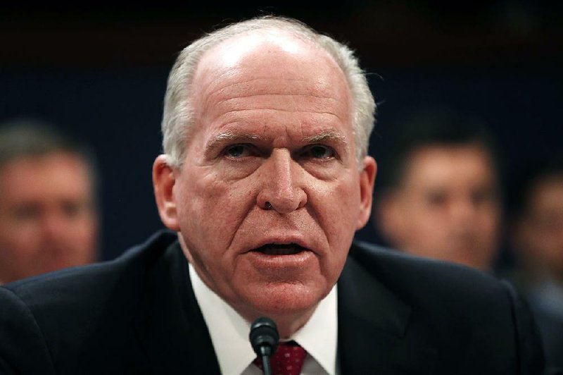 In this May 23, 2017, file photo, former CIA Director John Brennan testifies on Capitol Hill in Washington, before the House Intelligence Committee Russia Investigation Task Force. President Donald Trump is revoking the security clearance of former Obama administration CIA director Brennan.