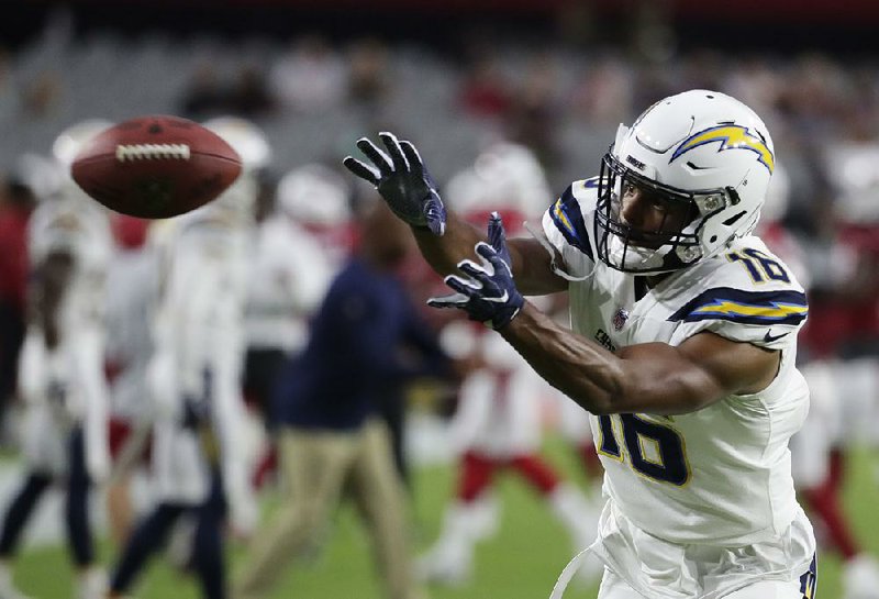 Los Angeles Chargers receiver Tyrell Williams catches a pass in last week’s exhibition game against the Arizona Cardinals. Williams and his teammates are using techniques this preseason taught by new receivers coach Phil McGeoghan, including ones he learned from the UFC’s Cris Cyborg. 