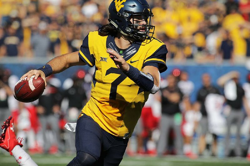 West Virgina quarterback Will Grier is the preseason Big 12 offensive player of the year after throwing for 34 touchdowns last year.  