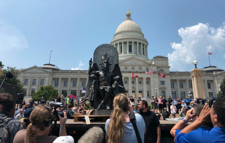 Scores of people attended a rally held by the Satanic Temple in Little Rock on Thursday, Aug. 16, 2018, and the group's 7-and-a-half-foot-tall Baphomet statue also made an appearance.

